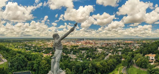 Aerial view of vulcan statue overlooking downtown Birmingham, AL
